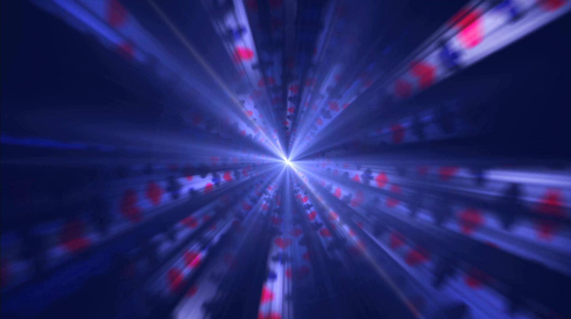 Abstract blue light burst with soft pink and red bokeh on a deep night-sky background